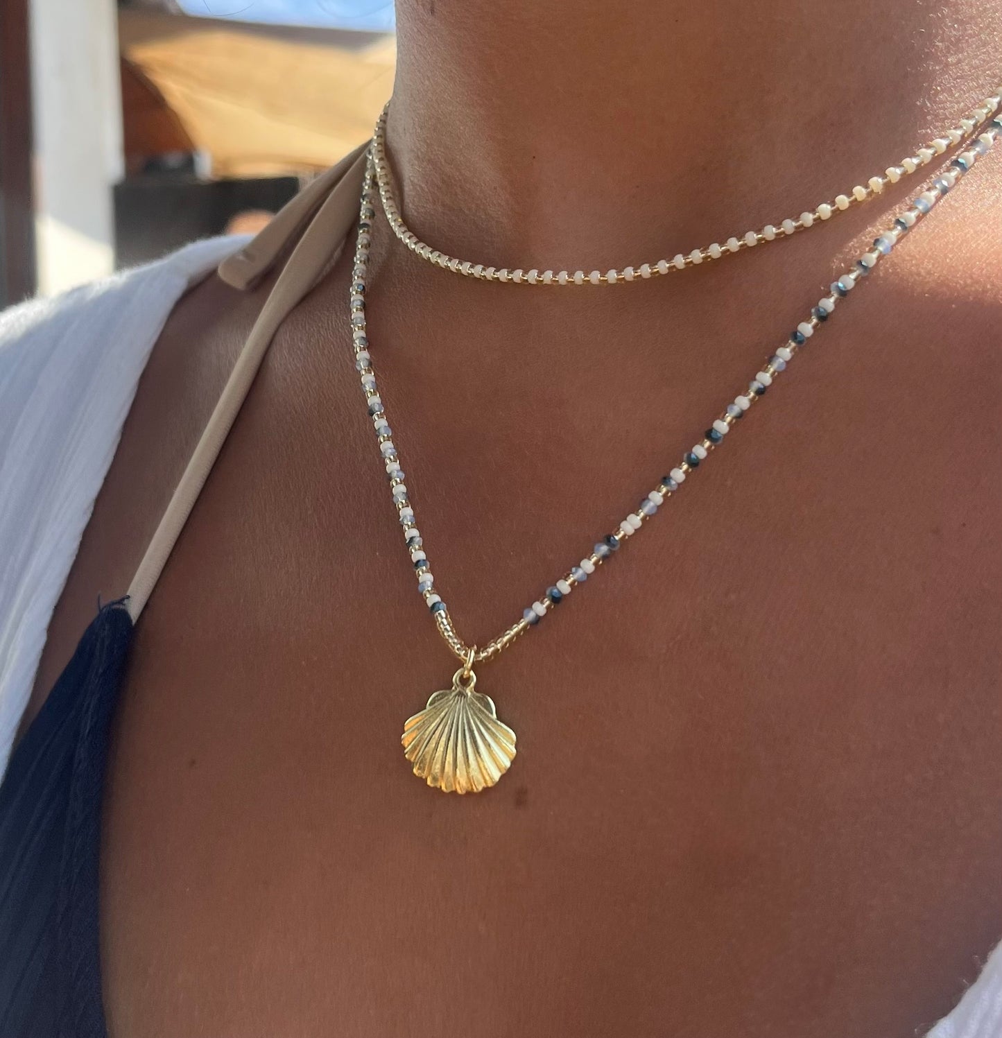 Collar cuentas con dije de Conchita